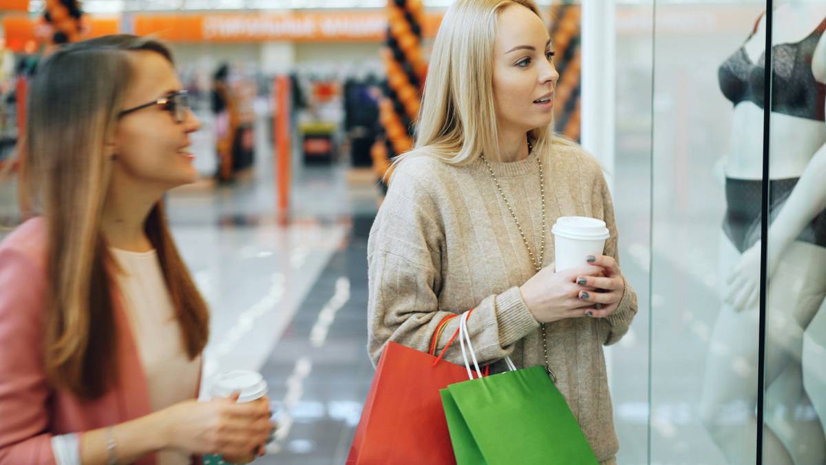 Confused shopper holding two similar products with thought bubble saying smart pick how can i be
